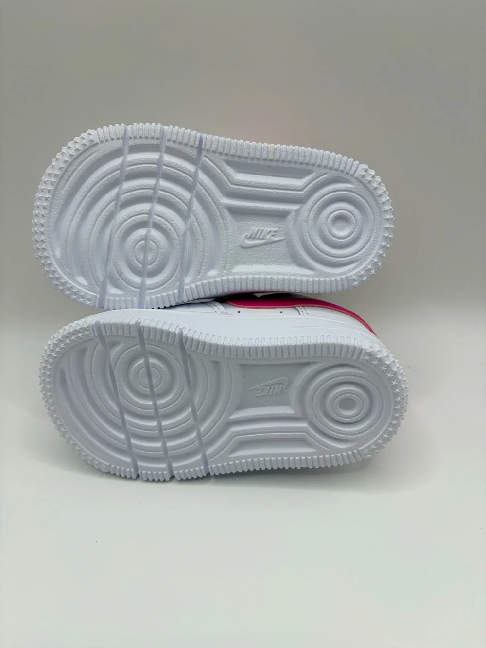 Nike Kids White Sneakers with Hot Pink Swoosh